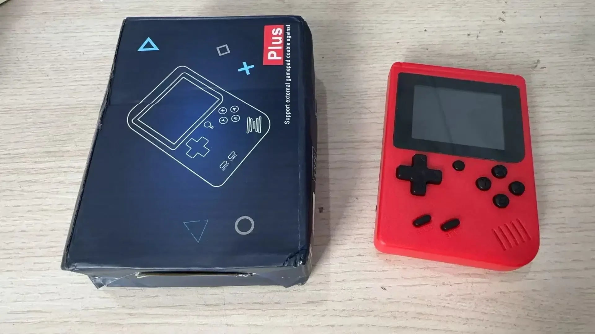 A Red Retro Classic Games Children's Handheld Small Game Console With 400 Game Charging Can Be Connected To The TV Quick Pick Grocers