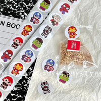 New 500PCS Avengers Roll Sticker MV Decorative Seal Sticker Circular Alliance Hulk Steel Iron Man Sticker Kids Gift Kawaii Quick Pick Grocers