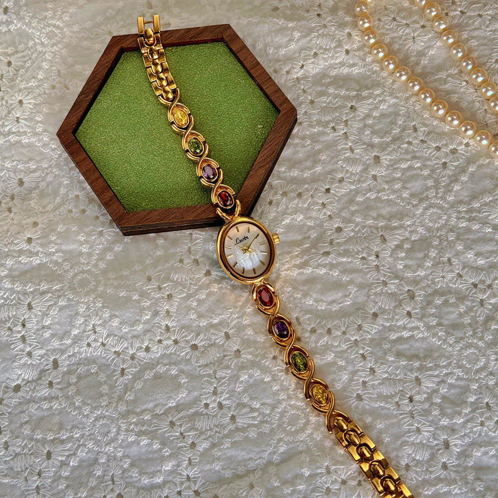 1pc New High-End Luxury Women's Watch Embedded With Colorful Tourmalines, Diamonds And An Oval Shaped Mother Of Pearl Dial. Quick Pick Grocers